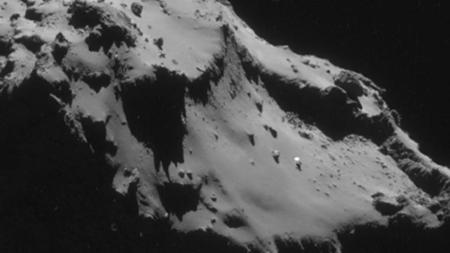 Quelle est ce mystérieux point blanc à la surface de la comète "Chury" ?Crédit:[ESA]